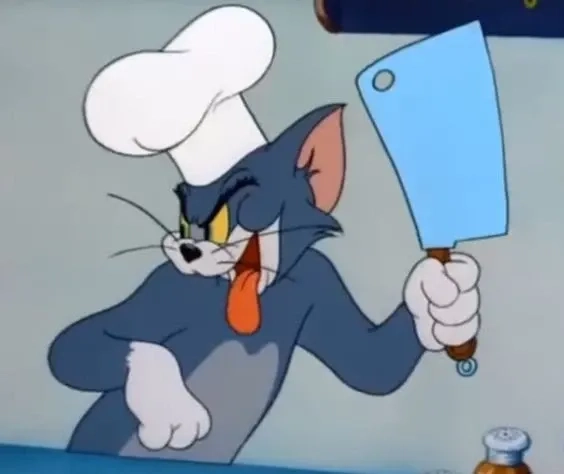 Meme mèo Tom cầm dao hài hước đầy kịch tính